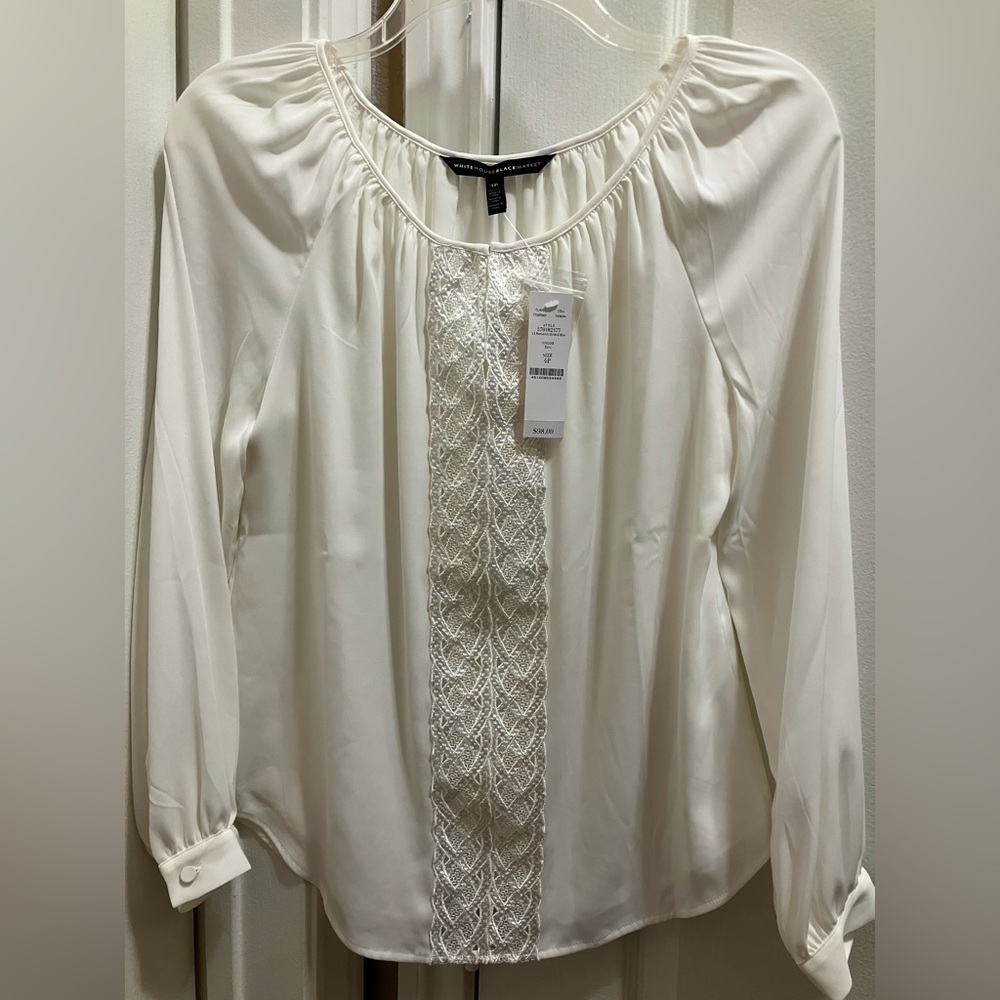 White House Black Market Elegant Blouse Lace Detail hook & eye closure at top.